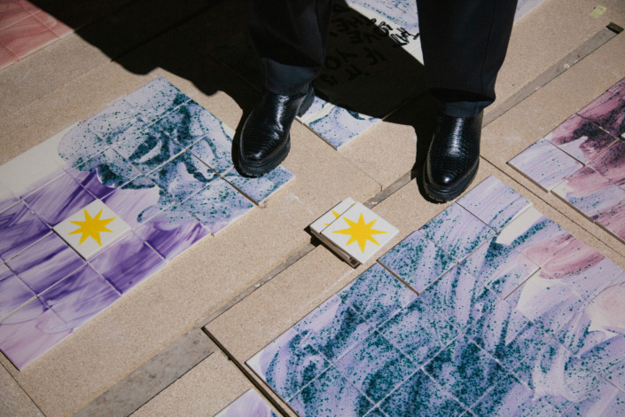 Detail of the blue and purple pattern on painted ceramic tiles for the Estonian Pavilion